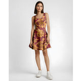 Bohemian sleeveless dress with intricate floral pattern in burgundy and gold, featuring a scoop neck and flared skirt