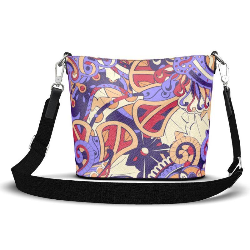 Vibrant paisley patterned Nappa leather bucket bag with adjustable shoulder strap