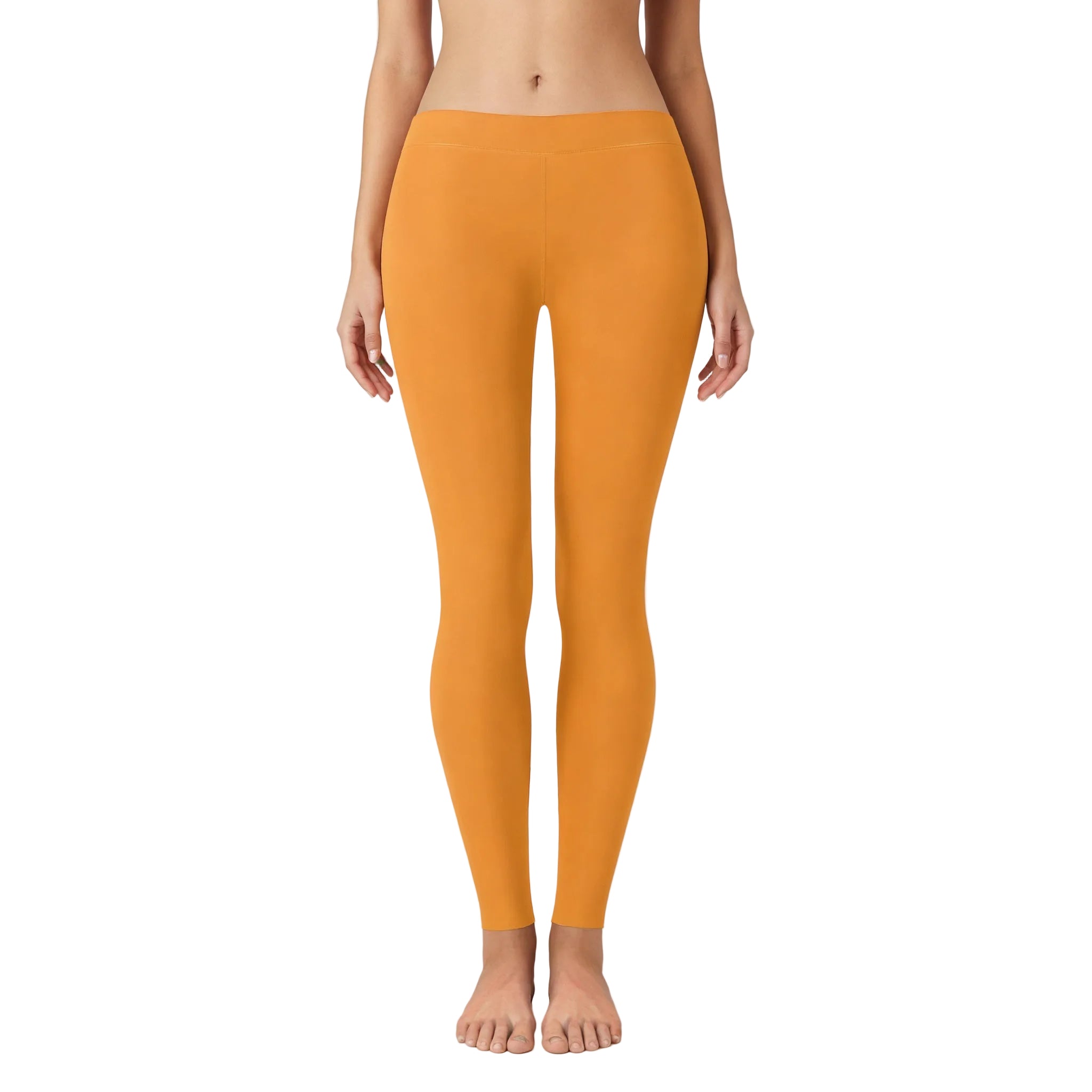 Shop our Core Series Essentials Tangerine Orange Leggings in a stunning tangerine color, featuring an elastic waistband, full-length cut, and low-waisted design. - Blissfully Brand