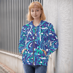 stylish blue, teal, and purple zip-up hoodie with a bold retro Kume abstract print. The unisex hoodie features a comfortable fit and kangaroo pockets. Geometric Vibrant - Blissfully Brand