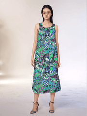 Bold and vibrant Nela dress by Blissfully Brand, featuring a retro-inspired, multicolored abstract swirl and floral pattern in greens, blues, and purples; sleeveless midi-length design perfect for making a statement for chic, retro fashion enthusiasts