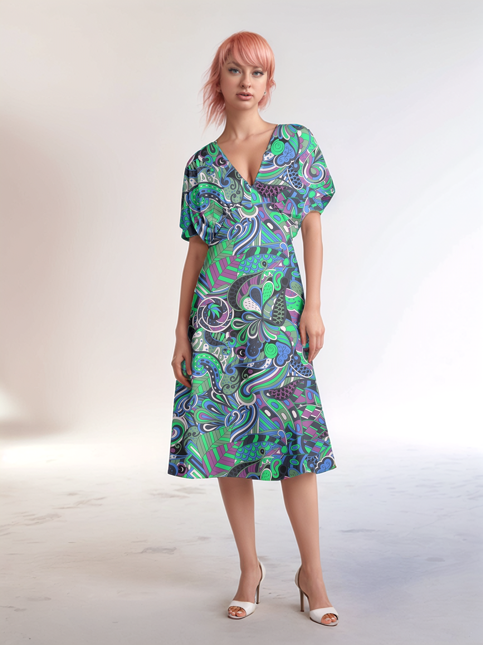 Bold and vibrant Nela dress by Blissfully Brand, featuring a retro chic design with a kaleidoscopic swirl of teal, purple, and green patterns, perfect for making a statement among bold, stylish dressers with a love for vintage-inspired flair.