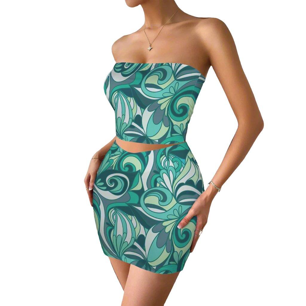 Trendy teal floral two-piece set: strapless crop top and mini skirt, tropical swirl pattern, figure-hugging silhouette, summer party outfit, beach vacation attire, fashion-forward women's clothing