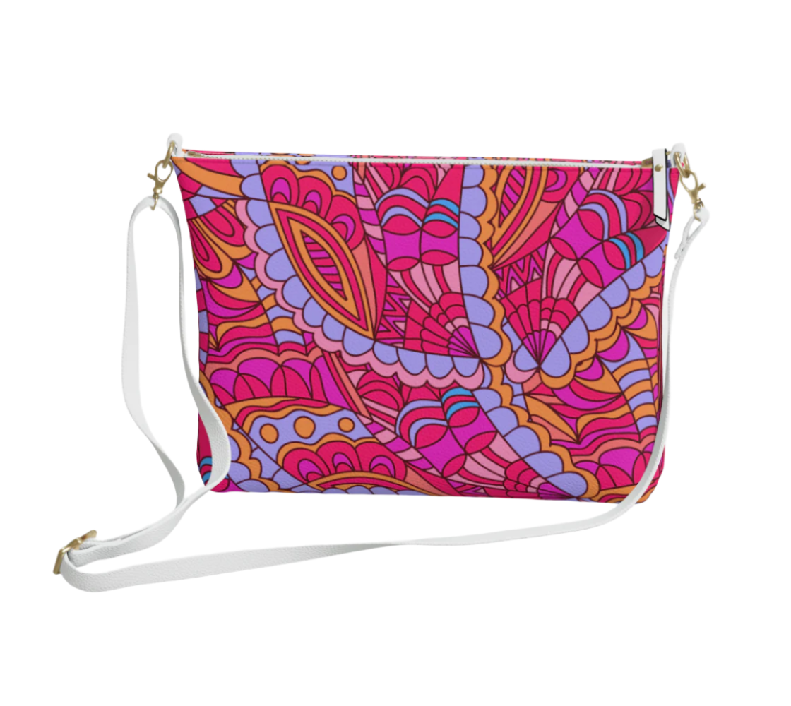 Palai Retro-inspired pink and purple floral pattern vegan leather crossbody bag with white detachable strap. Bold and vibrant statement purse - Blissfully Brand