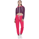 Women's contrasting red 2 piece lounge set with a cropped hoodie and matching sweatpants. The set is perfect for casual wear and lounging around the house. The sweatpants feature a drawstring waistband and cuffed ankles. The hoodie features a zipper closure and a hood. T