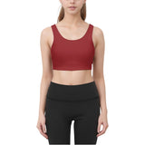 Serena Deep red racerback sports bra with strappy crisscross back design, made from eco-friendly and peach skin fabric. Blissfully Brand